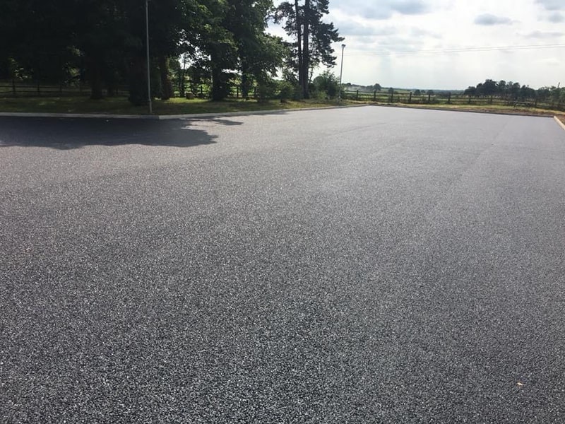 Newly laid tarmac commercial car park