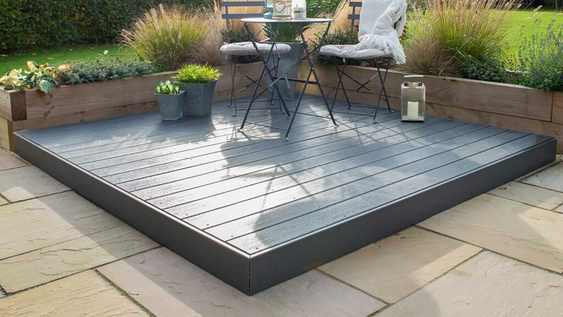 Grey composite decking with planting